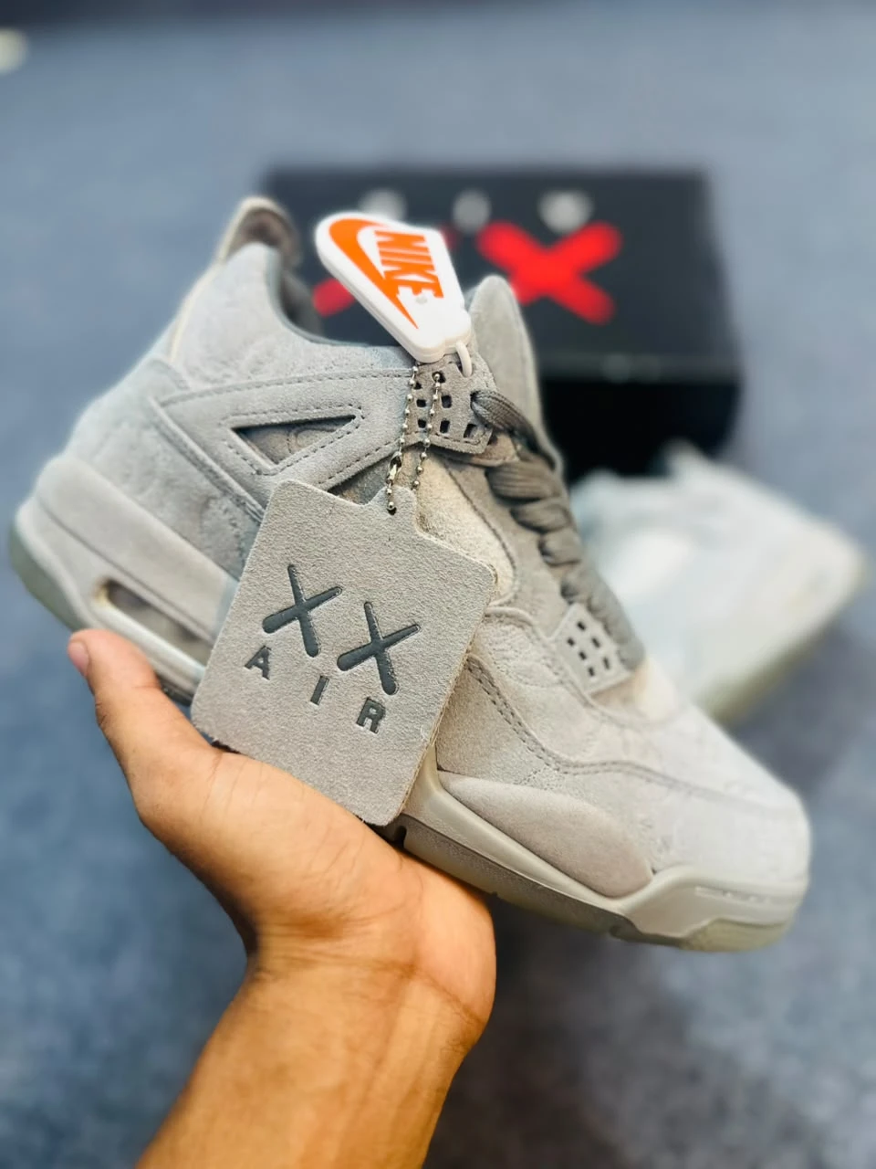 KAWS x Air Jordan 4 Cool Grey