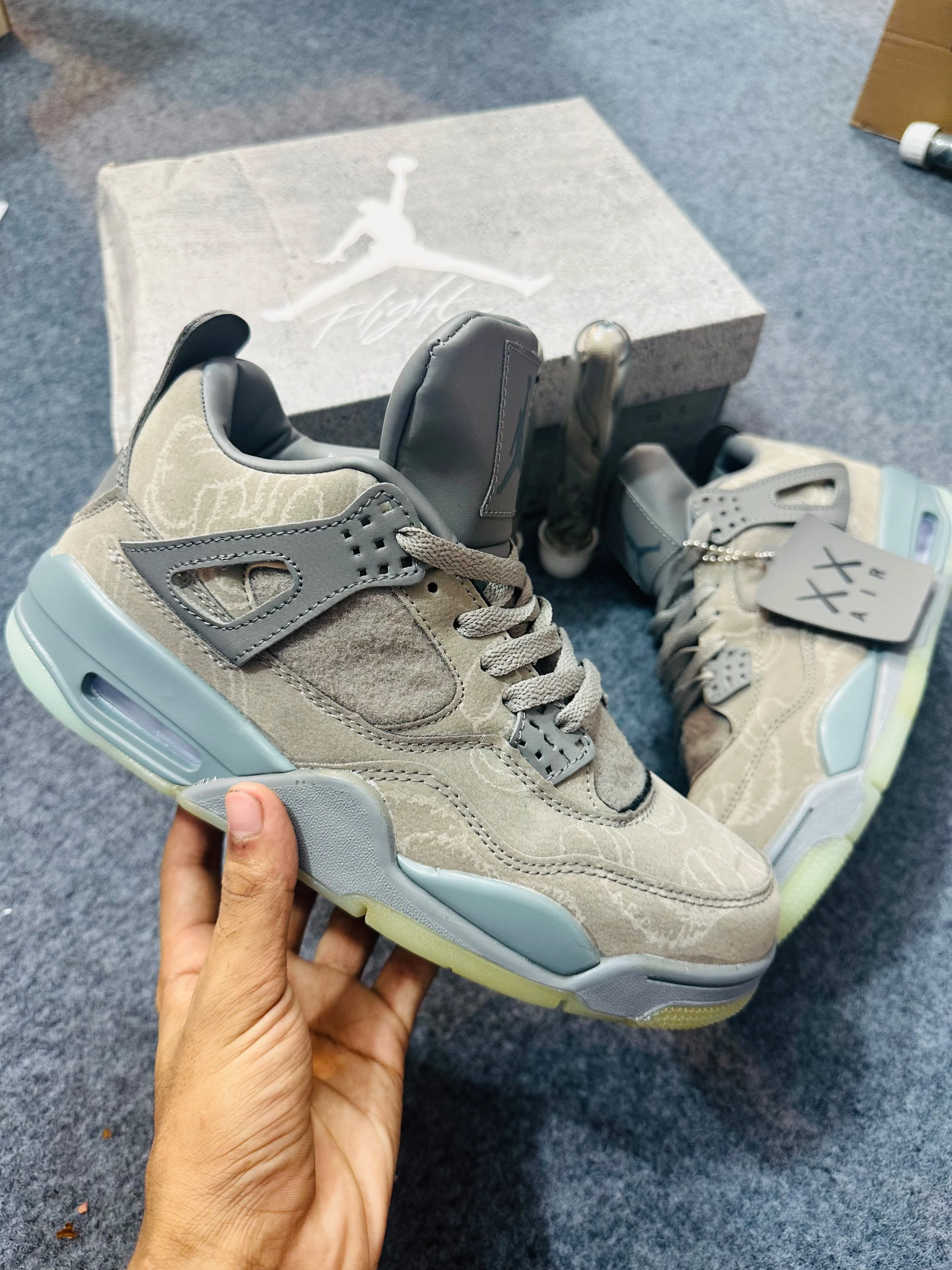 Jordan 4 KAWS “Cool Grey